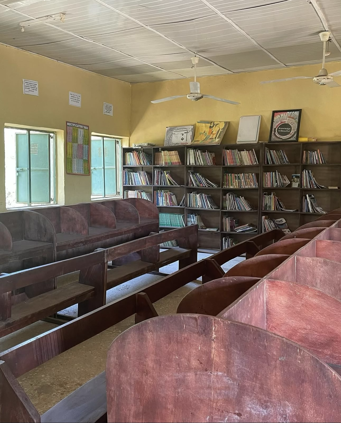 Children reading inside the YACT community library in rural Abuja