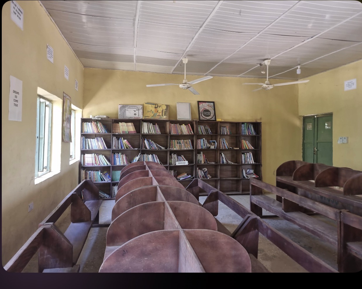 Inside the YACT library — shelves of books and rows of reading desks